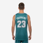 Opposite side view of teal sublimated basketball jersey displaying the white side panel and striped armhole binding detail