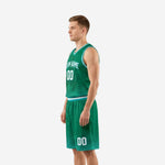 Right-side view of the green basketball uniform set highlighting the athletic cut jersey and elastic waistband with teal stripe on the shorts