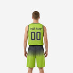 Opposite side view of charcoal and lime green reversible basketball uniform showing hex pattern fade from shoulder to hem and shorts leg detail