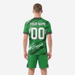 Custom soccer uniforms in Kelly Green with black and white scratch design, team kit detail