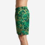 Other side view of green camo basketball shorts showing gold crackle graphic overlay and athletic cut leg opening