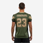 Right side view of sublimated green and gold football jersey showing consistent shoulder panel design, short set-in sleeve cut, and straight hem on the black side panel