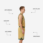 Shorts detail of green and gold reversible basketball uniform set showing hex cluster graphic on left leg, player number on right leg and gold hem stripe