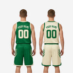 Close-up detail of sublimated slash graphic on green reversible basketball jersey shoulder showing fade-resistant print quality