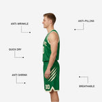 Opposite side view of custom green and cream white reversible basketball uniform showing slash graphic detail on shorts leg