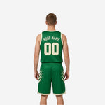 Detail of cream white reversible basketball shorts showing green hem binding elastic waistband and drawcord construction