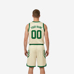 Side view of green and white reversible basketball uniform showing armhole binding and side panel construction on adult male model
