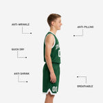 Back view of green youth basketball uniform set showing team name arc and player number in white sublimated print on jersey