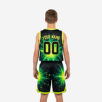 Back view of custom green youth basketball uniform set showing back player name and number on black starburst sublimated jersey