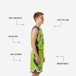 Back view of lime green youth basketball jersey and shorts set showing player number placement and charcoal side panels