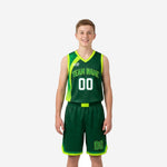Green youth basketball uniforms - forest green V-neck jersey with neon-lime curved side panel and matching shorts, front view full set