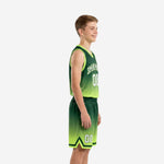 Front view of custom green youth basketball uniforms with arched team name and number on gradient forest green to lime jersey