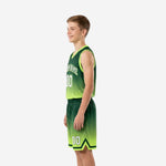 Side view of youth sublimated basketball uniforms showing lime green gradient fade and geometric hex texture on jersey and shorts