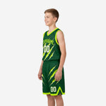 Side view of green youth basketball uniforms showing neon yellow-green armhole binding V-neck collar and matching shorts claw pattern on youth model
