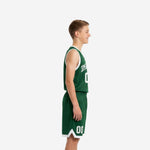 Side view of green youth basketball uniforms with white armhole binding and matching shorts with pointed white hem trim, custom number 00