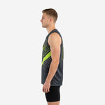 Left side view of the charcoal and lime green sublimated basketball jersey showing the sleeveless cut and halftone dot scatter pattern