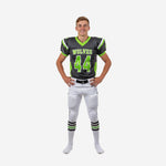 Grey youth football uniforms in charcoal and lime green with arched team name and front number 44, full set front view