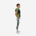 Side view of grey and lime green youth American football uniform showing sleeve number and white pants with charcoal leg stripe