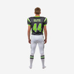Opposite side view of custom grey youth football uniform with lime green V-neck collar and matching pant side panel