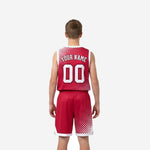 Opposite side view of custom red youth basketball uniform set showing matching halftone fade on jersey and shorts leg