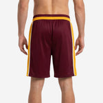 Opposite side view of maroon custom basketball shorts with gold panel running from waistband to hem