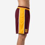 Side view of maroon and gold custom basketball shorts showing full-length gold side panel with white pinstripe trim
