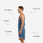 Back view of custom home and away reversible basketball uniforms showing back number and player name print zones on the steel-blue side
