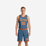 Home and away reversible basketball uniforms in steel blue with orange topographic pattern, team name and number 00 on jersey and matching shorts - front view