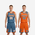 Full set view of the custom reversible basketball uniform in steel blue and orange with matching jersey and shorts laid flat