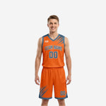 Custom home and away reversible basketball uniforms showing the orange side with steel-blue slash marks, arched team name, and front number 00