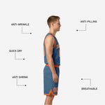 Back view of home and away reversible basketball uniforms in steel blue and orange with back number and player name placement visible