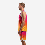 Right side view of hot pink to orange sublimated basketball uniform set with shorts detail