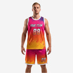 Front view of hot pink and orange gradient custom basketball uniforms with team name and number 88