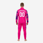 Detail view of the hot pink zip jacket with Royal Purple splash sleeve panel from the custom pink soccer tracksuit set