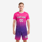 Men's hot pink to royal purple gradient custom pink soccer uniform set, full front view showing team name and number sublimated on jersey and shorts