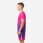 Right side view of hot pink purple gradient custom soccer uniform displaying white side stripe on shorts and white crew neck trim detail