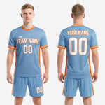 K2 Sportswear sky blue and orange full soccer uniform set with custom team name and player number