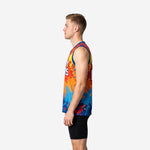 Opposite side view of custom sleeveless basketball jersey in blue and orange splash design showing armhole binding and athletic cut on adult male model