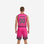 Reversible basketball uniform charcoal side front view with pink team name, pink front number, and matching halftone dot fade shorts