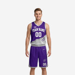 Light and dark reversible basketball uniforms in purple and silver with diagonal slash graphic and white team name on the purple side front view