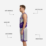 Silver reversible basketball uniform back view showing purple player name and number sublimated on the silver reverse side