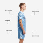Close-up of ice blue and white crystal print sublimated across the chest and shoulders of a light blue soccer uniform