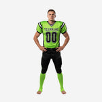 Lime green and black custom american football uniform supplier set with V-neck jersey, curved black side panels, white trim, and matching black pants with lime green leg stripe - front view