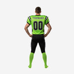 Opposite side view of lime green and black sublimated football uniform showing V-neck collar, shoulder seam construction, and below-the-knee black pant length
