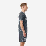 Charcoal and white marble soccer kit side view showing jersey and shorts matching pattern