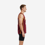 Custom maroon and gold basketball jersey showing arched team name lettering and white-outlined front number on solid maroon body