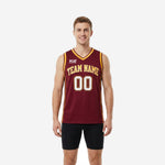 Maroon and gold basketball jerseys with arched team name on chest, front number 00, and gold V-neck and armhole binding on a male model
