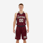 Maroon and gold basketball uniforms showing front and back of the fully sublimated 2-piece set with cream side panels and black trim