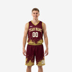Front view of custom maroon and gold basketball uniforms showing splash pattern jersey and matching shorts with team name and number 00
