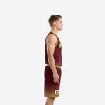 Custom maroon and gold basketball uniform jersey front showing arched team name gold lettering and white front number 00 on deep maroon base